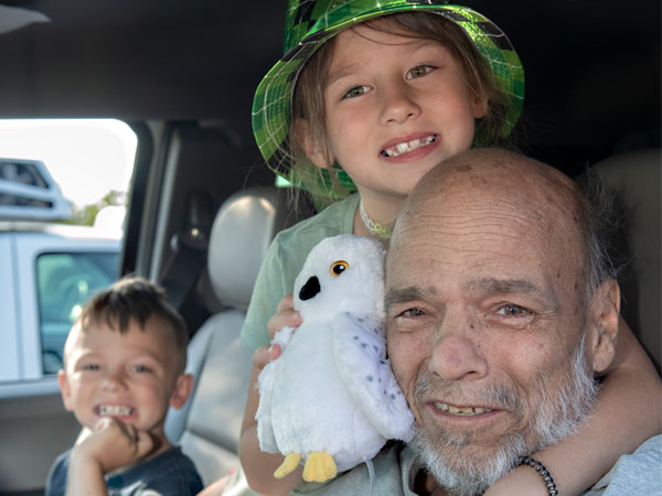 William and kids in car