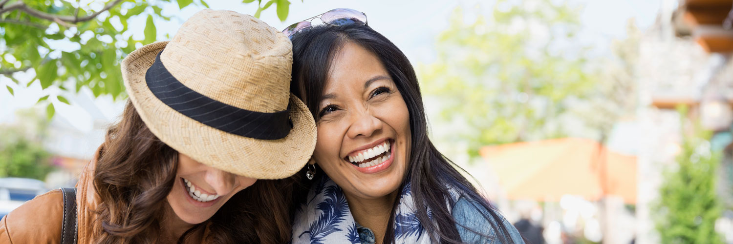 Two young ladies laughing