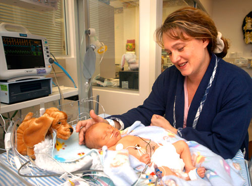 Nurse taking care of infant